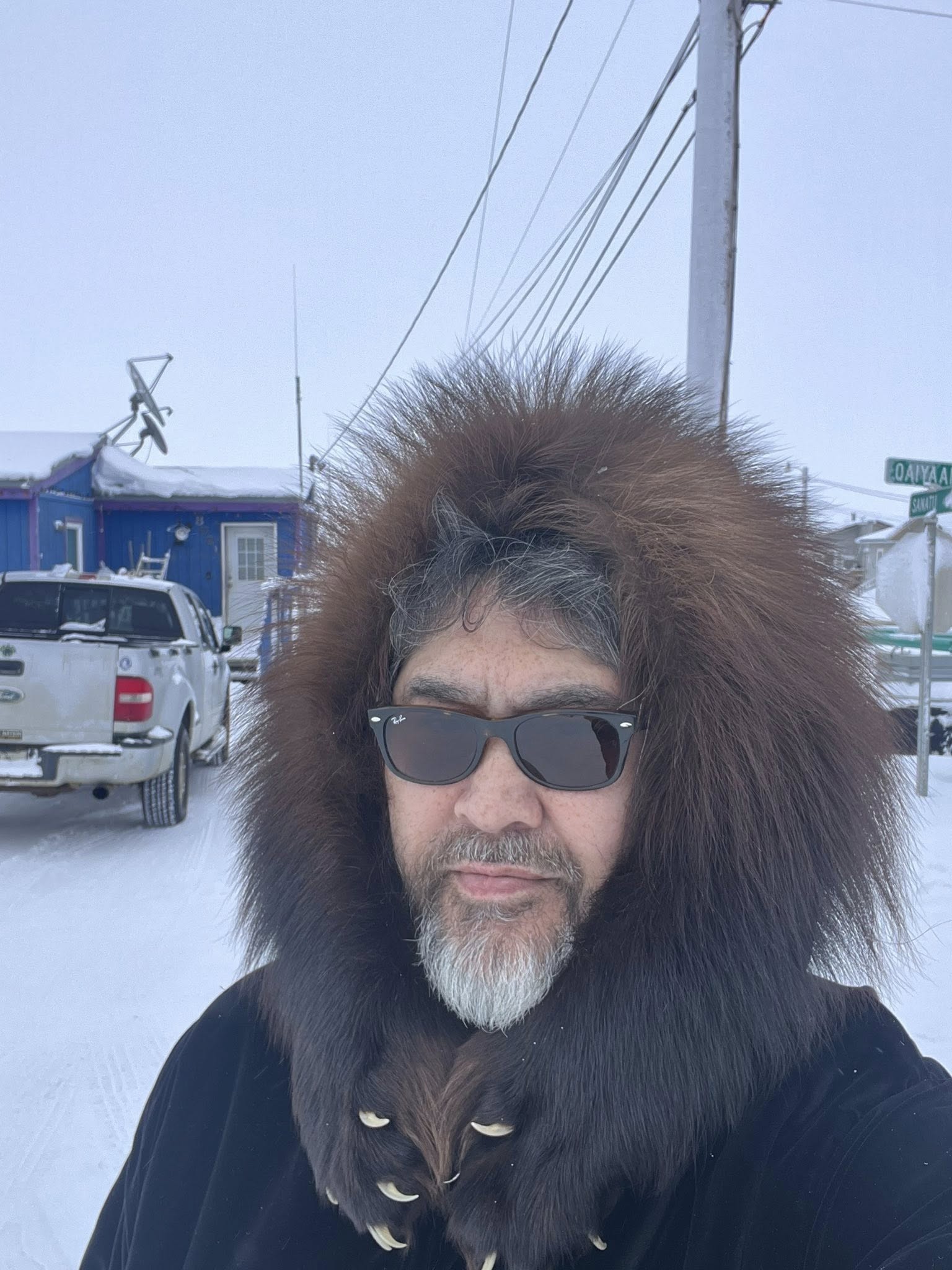Robin Mongoyak, Kiita Tours guide, wearing a traditional Iñupiat fur parka in Utqiaġvik, Alaska